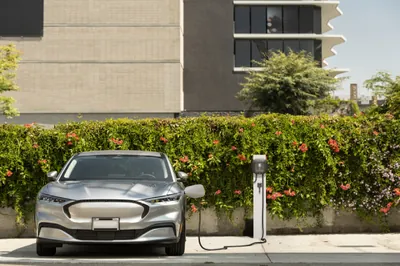 EV charging station at a commercial parking lot increasing property value.