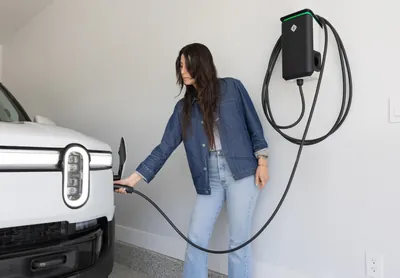Level 2 and DC fast charging stations at a commercial parking lot.