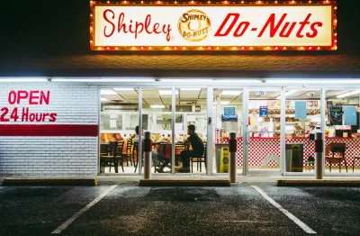 Upscale urban restaurant district where customers pay for parking to access quality dining.